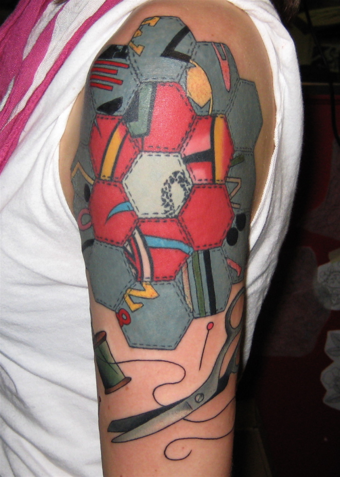 Awesome Quilting Tattoo On Left Shoulder