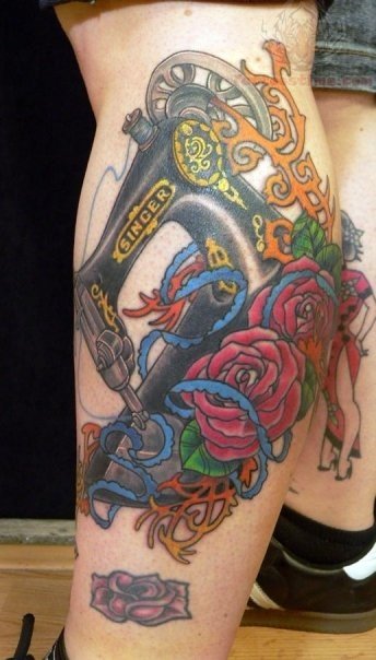 Awesome Sewing Machine And Color Flowers Tattoo On Leg