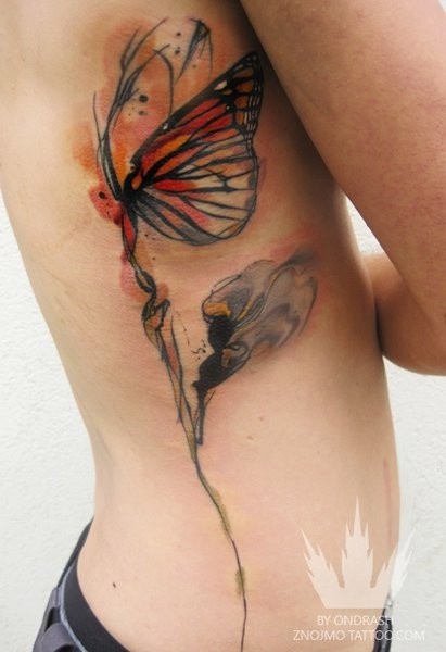 Awesome Watercolor Monarch Butterfly Tattoo On Side Rib