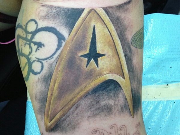 Awesome Yellow Star Trek Logo Tattoo