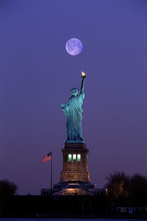 Back View Of Statue Of Liberty With Full Moon View