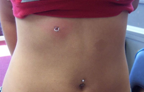Belly Piercing And Third Nipple Piercing For Women