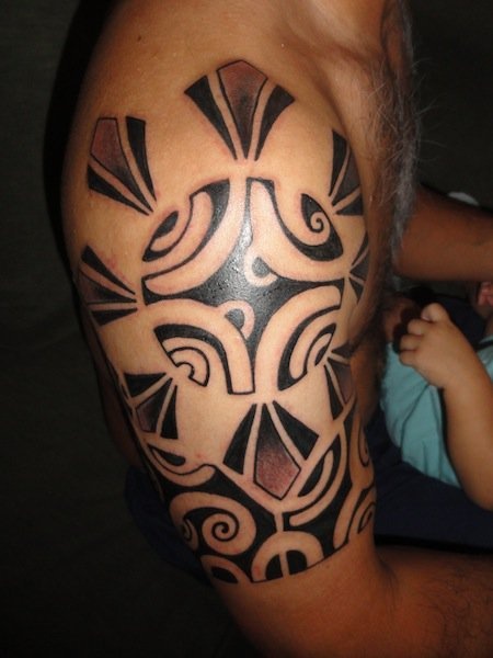 Black Ink Tribal Filipino Tattoo On Right Half Sleeve