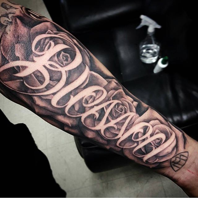 Blessed Word Latino Font Tattoo On Arm