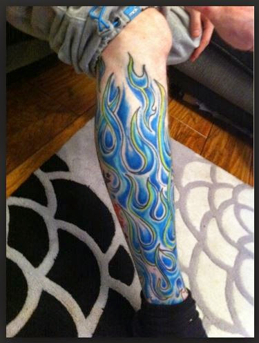 Blue And Green Flame Tattoo On Leg