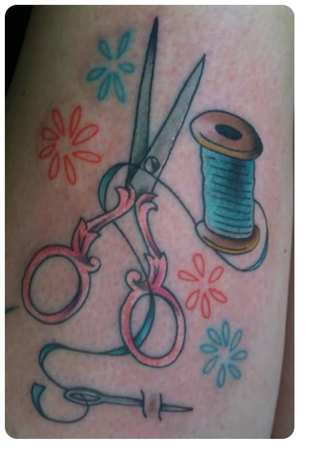 Blue Spool With Scissor And Sewing Needle Tattoo