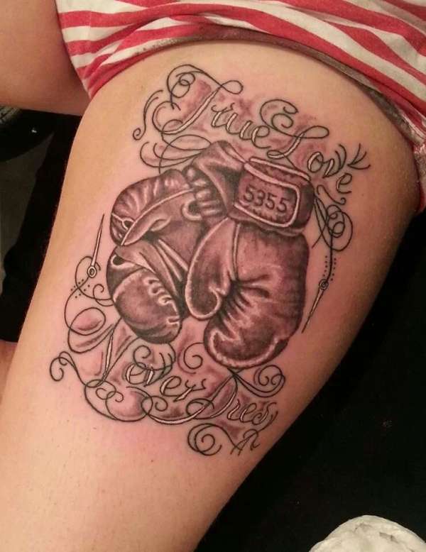 Boxing And Sewing Marriage Tattoo On Left Thigh