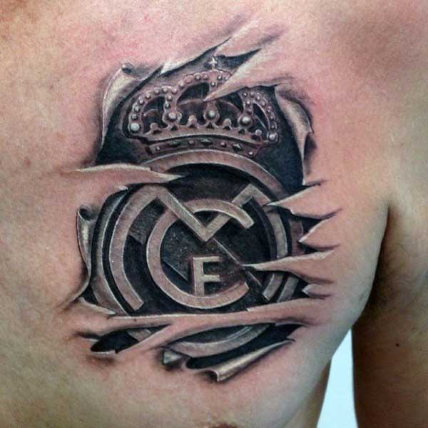 Brilliant Ripped Skin Real Madrid Logo Tattoo On Chest