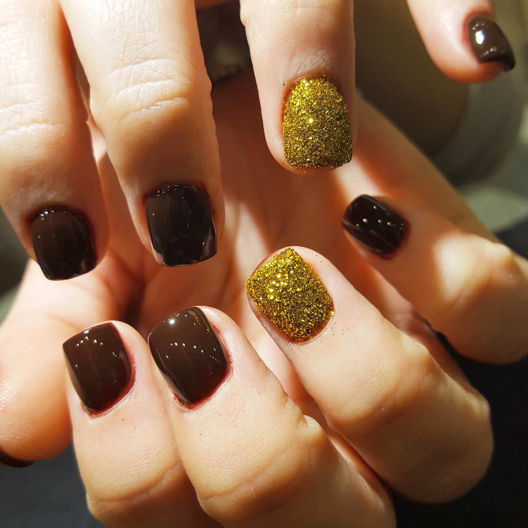 Brown Nails With Accent Gold Glitter Nail Art.