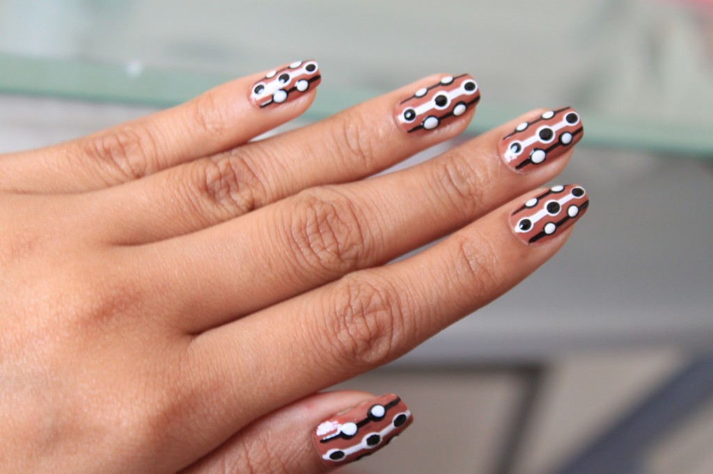 Brown Nails With Black And White Polka Dots Nail Art Idea