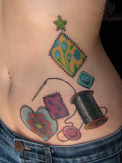Button And Spool Sewing Tattoo On Girl Hip