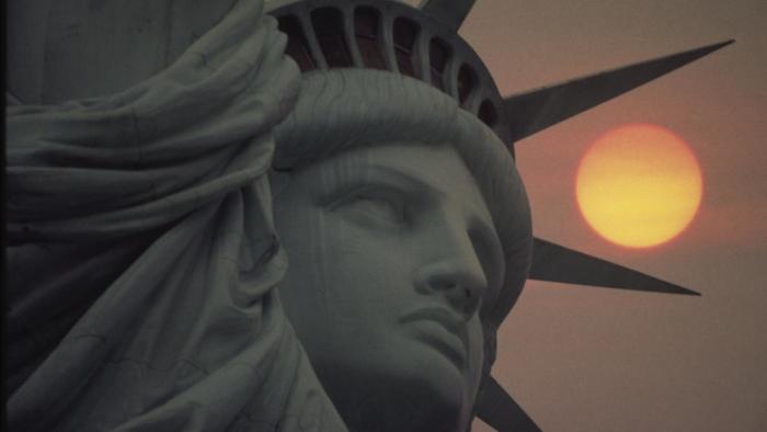 Closeup Of Statue Of Liberty With Sun View