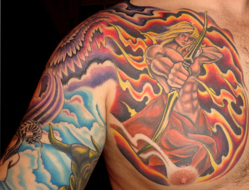Color Ink Sagittarius In Flame Tattoo On Chest