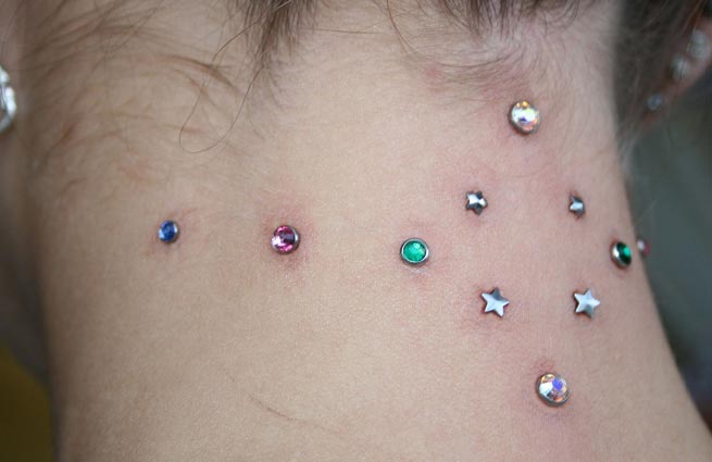 Color Microdermal Piercings On Nape For Girls