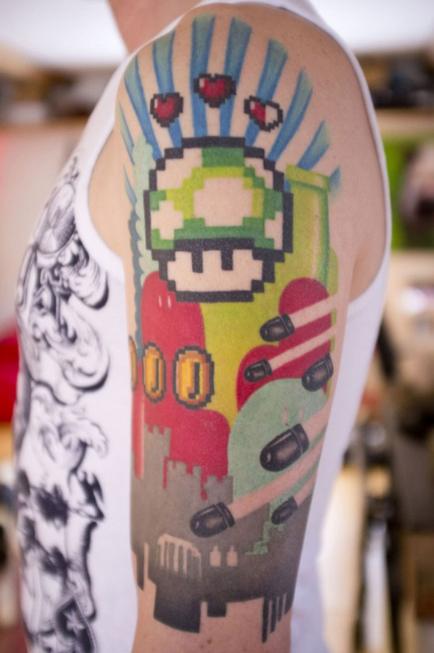 Colorful Retro Mario Tattoo On Left Half Sleeve