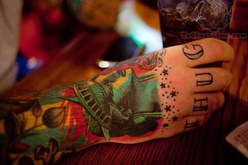 Colorful Thug Tattoo On Arm To Hand