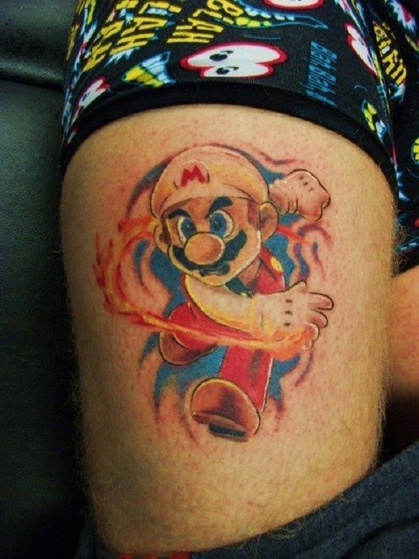 Cool Fire Mario Tattoo On Thigh