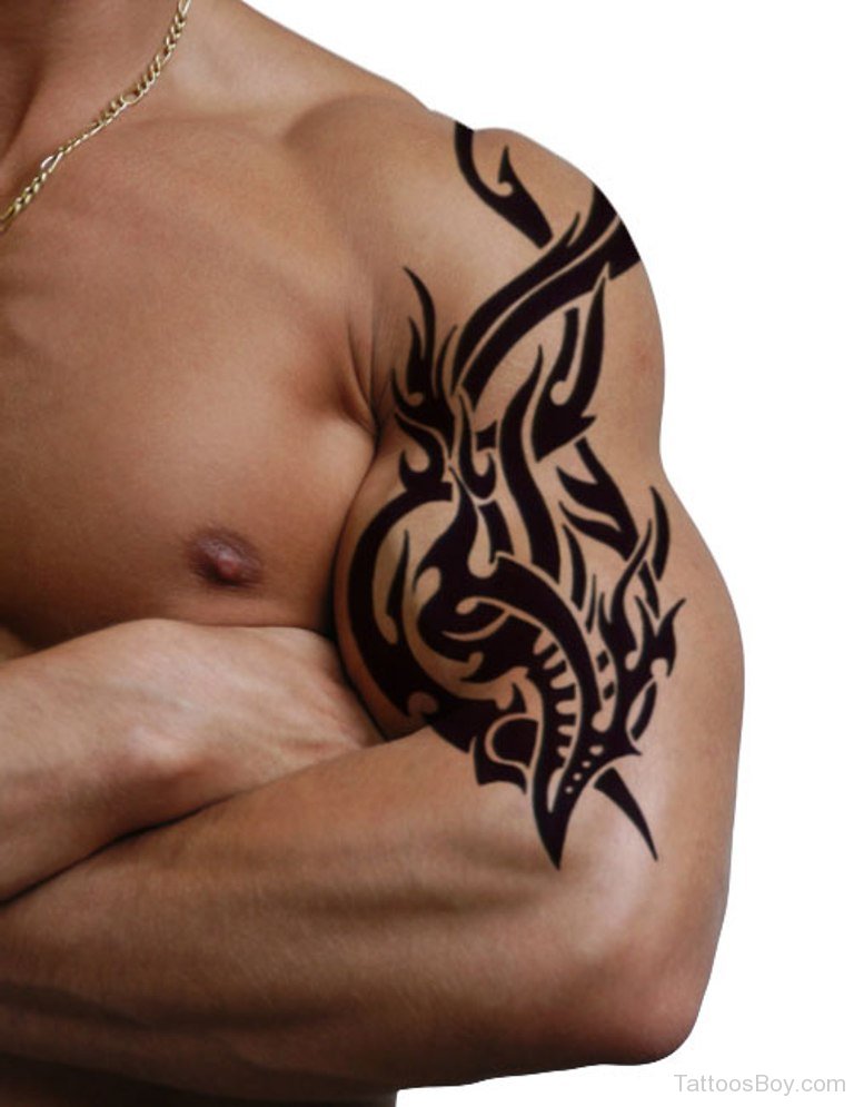 tribal flame tattoos on arm