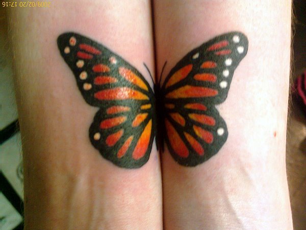 Creative Monarch Butterfly Tattoo On Both Wrists