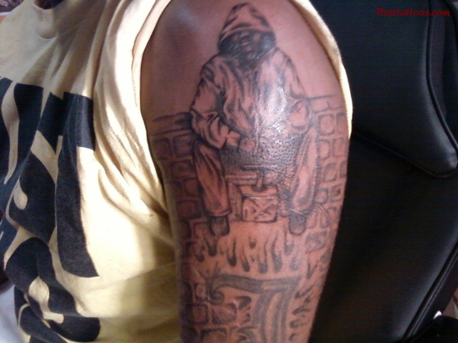 Dark Thug And Flames Tattoo On Arm
