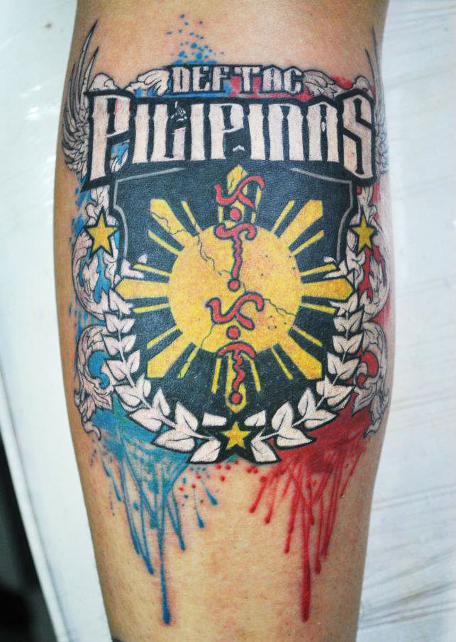 Deftac Filipino Color Splashes Tattoo On Arm