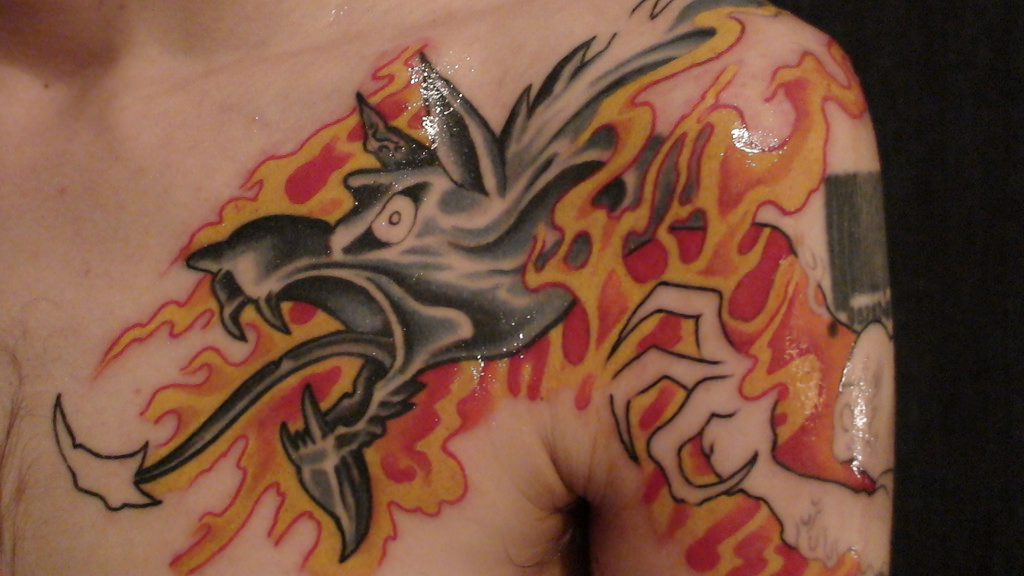 Dragon And Flame Tattoo On Chest And Shoulder