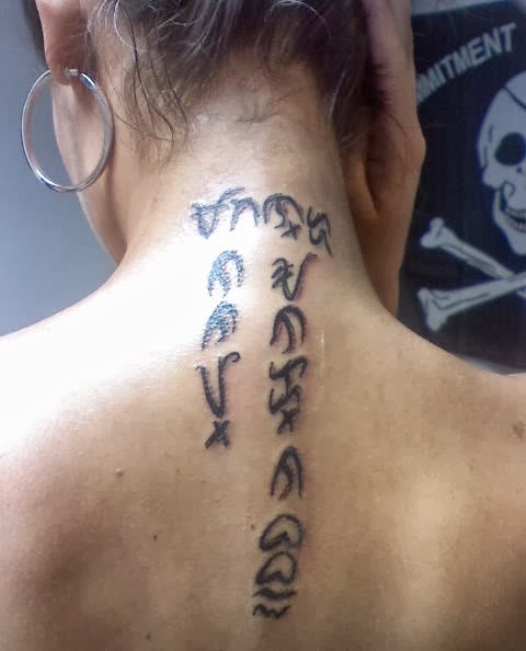 Filipino Language Tattoo On Upper Back For Girls