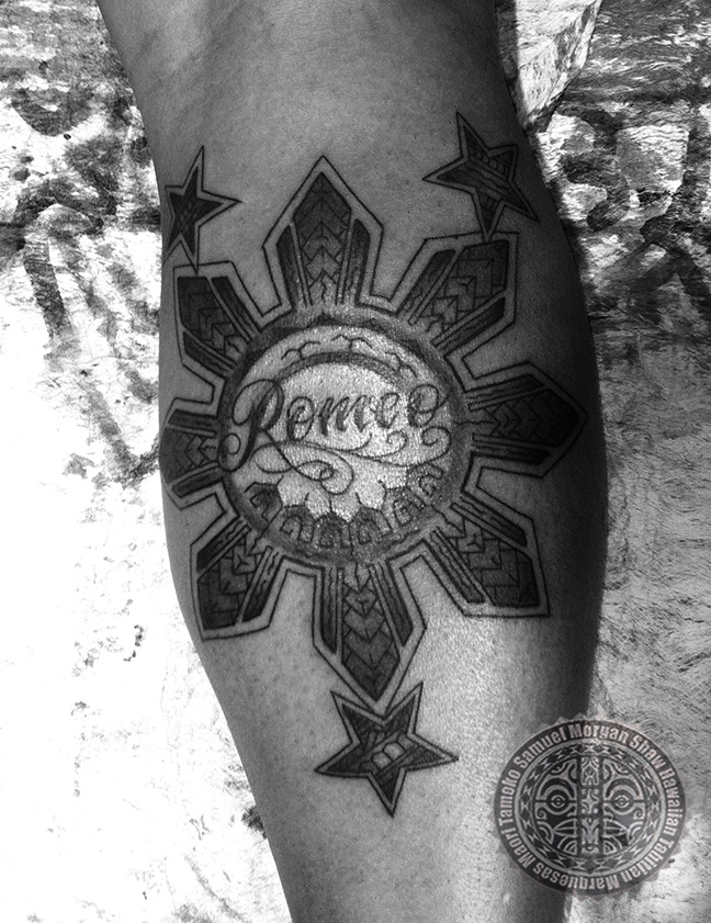 Filipino Sun And Lettering Tattoo