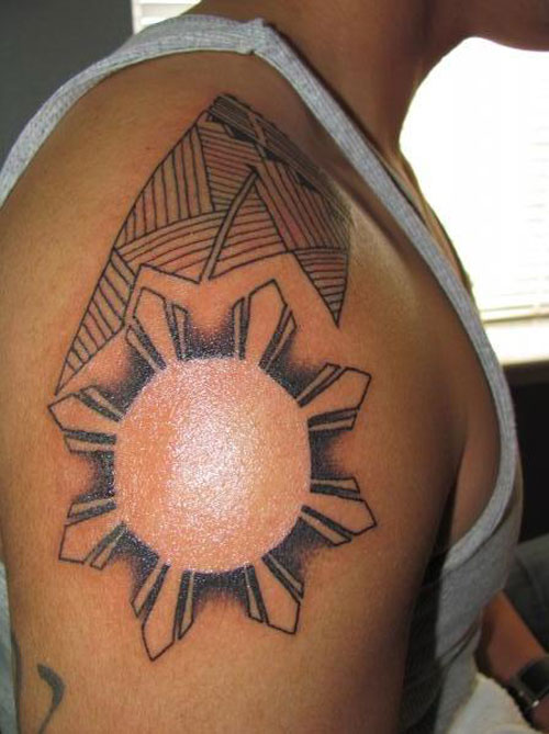 Filipino Sun Tribal Tattoo On Man Right Shoulder