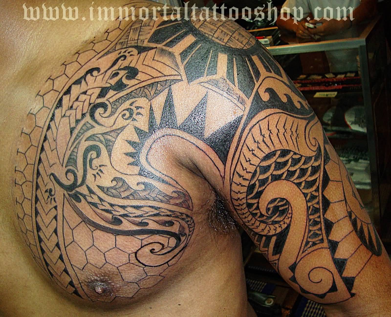 Filipino Tattoo On Chest And Left Shoulder