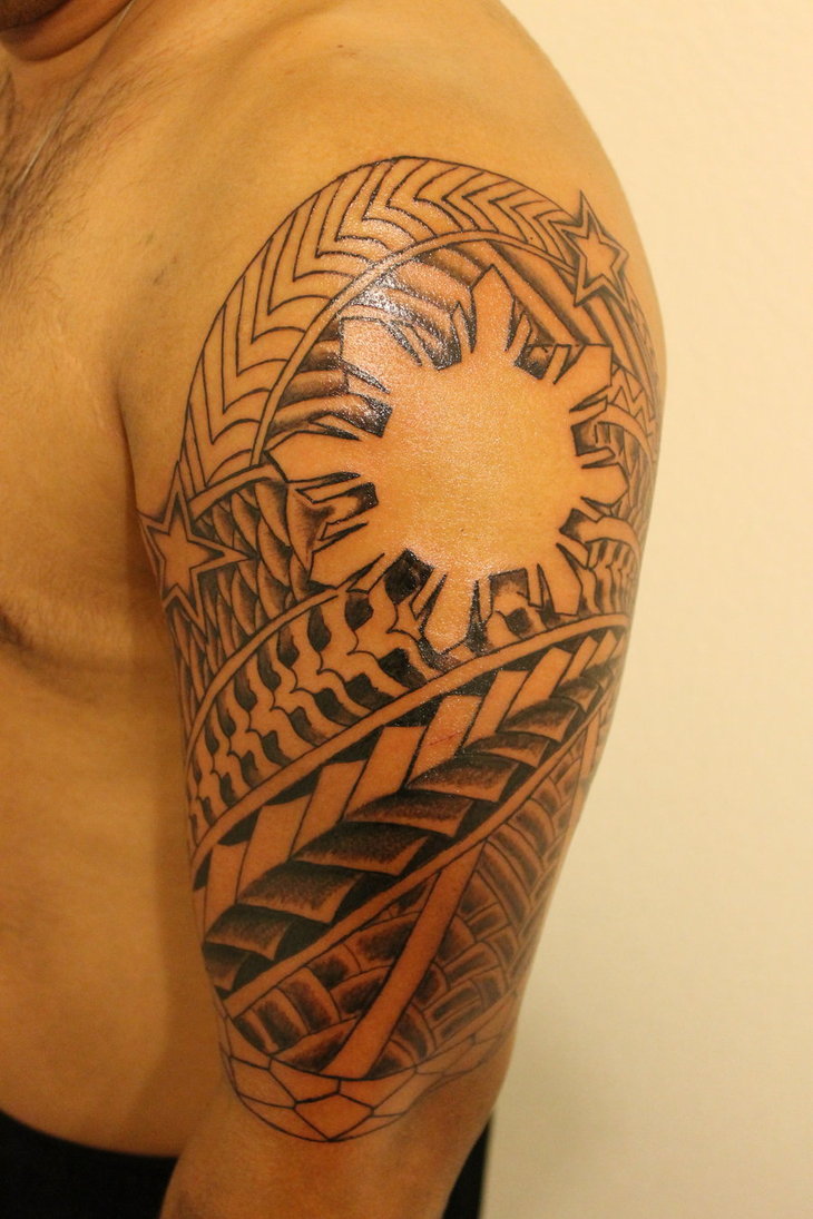 Filipino Tattoo On Man Left Half Sleeve