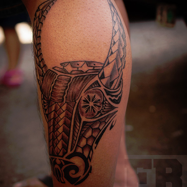 Filipino Tribal Carbao Tattoo On Leg