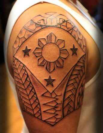 Filipino Tribal Sun Tattoo On Man Shoulder