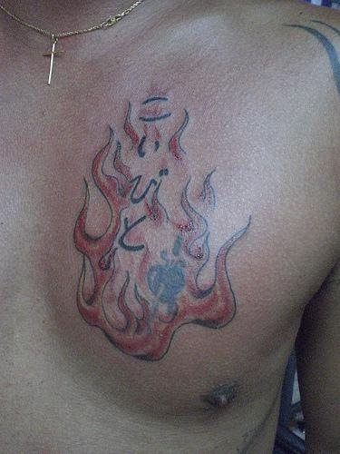 Flames Of Fire Tattoo On Chest