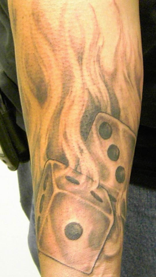 Flaming Dices Tattoo On Arm Sleeve