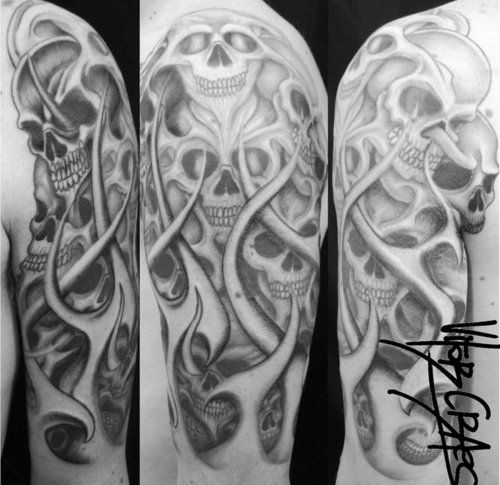 Flaming Skulls Tattoo On Half Sleeve