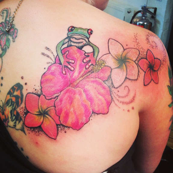 Frog With Flowers Tattoo On Girl Upper Back