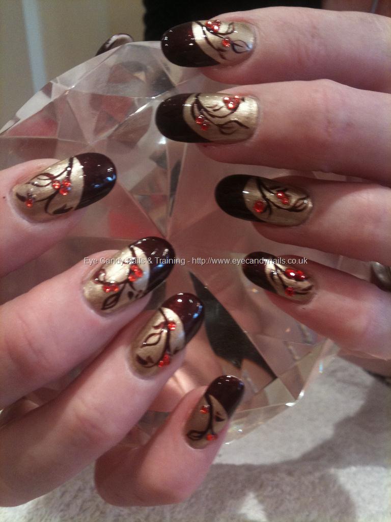 Gold Nails With Brown Tip And Red Rhinestones Floral Design Nail Art