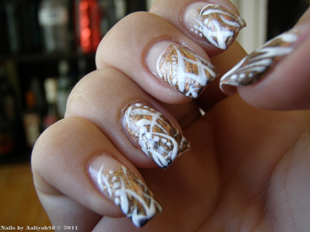 Gold Nails With White Stripes Design Nail Art