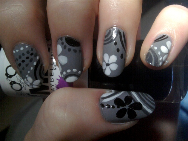 Gray Nails With Black And White Flowers Design Idea