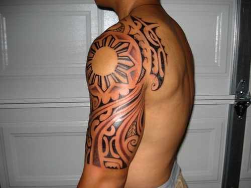 Grey Ink Filipino Tribal Tattoo On Left Half Sleeve