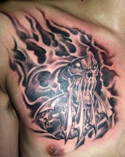 Grey Ink Flaming Evil Skull Tattoo On Chest