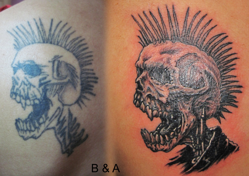 Grey Ink Punk Tattoo On Left Back Shoulder
