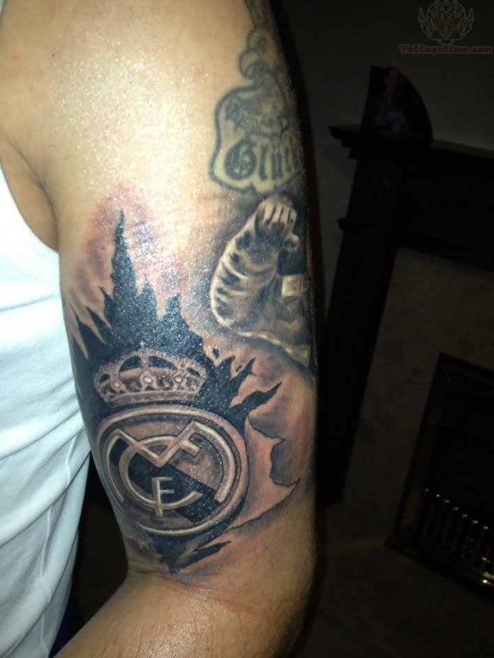 Grey Ink Real Madrid Logo Tattoo On Left Half Sleeve