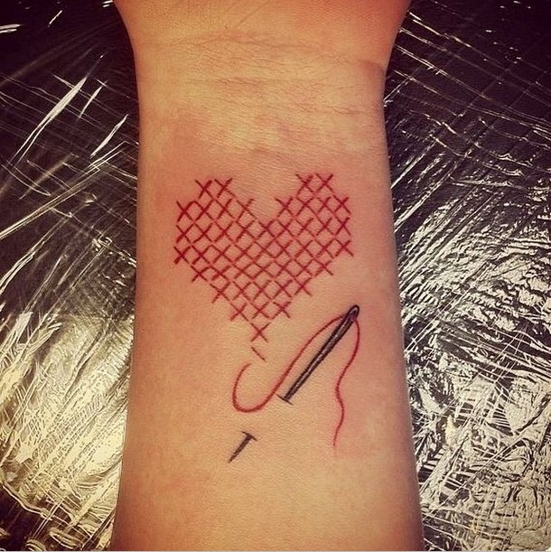 Heart Stitch Sewing Needle Tattoo On Wrist