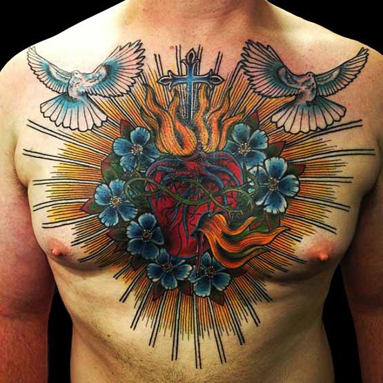Heart With Cross In Flame And Flying Dove Tattoo On Chest