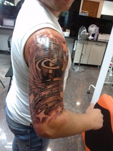 Impressive Grey Ink Real Madrid Logo Tattoo On Right Half Sleeve