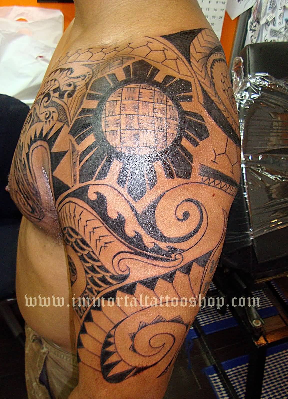 Impressive Man Chest And Shoulder Filipino Tattoo
