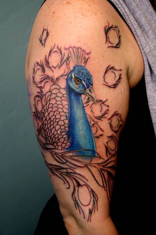 Impressive Scottish Peacock Tattoo On Right Half Sleeve