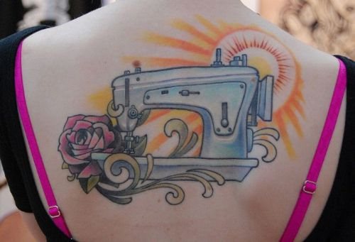 Impressive Sewing Machine With Sun Tattoo On Girl Upper Back